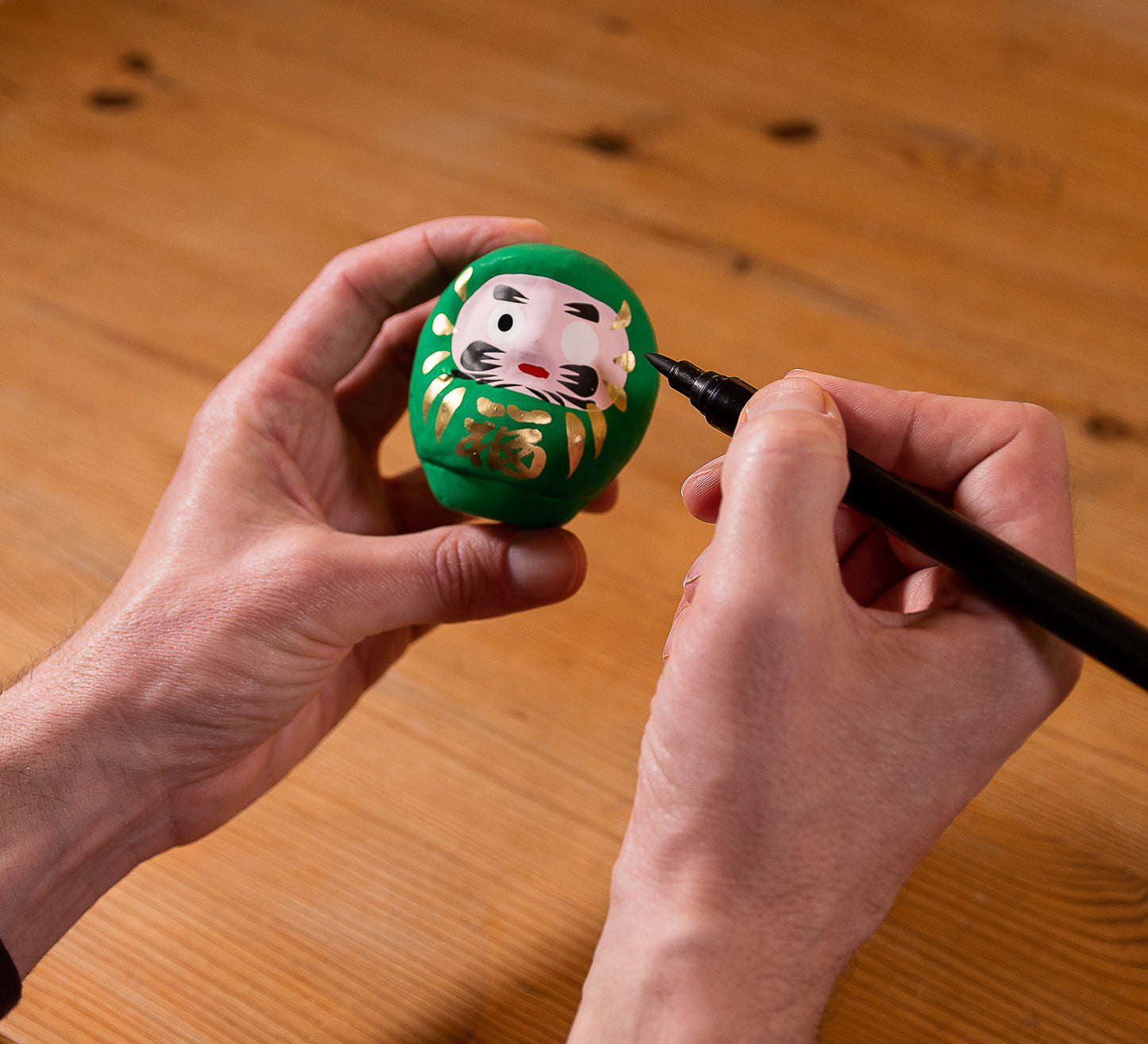 Grünes traditionelles Daruma - Gesundheit, Medium