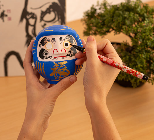 Daruma Tradicional Azul 12 cm, Éxito académico